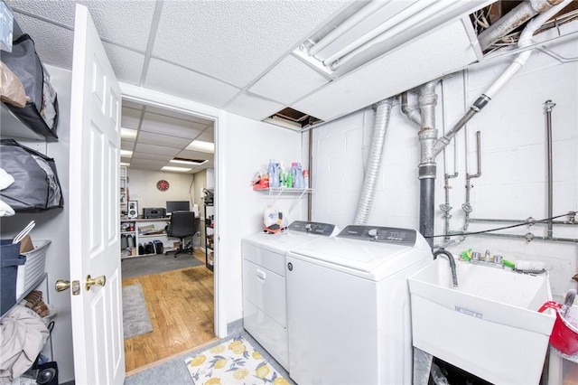 5215 Caste Dr, Whitehall, PA 15236 - washroom with washer and clothes dryer, a desk, and light wood-style flooring