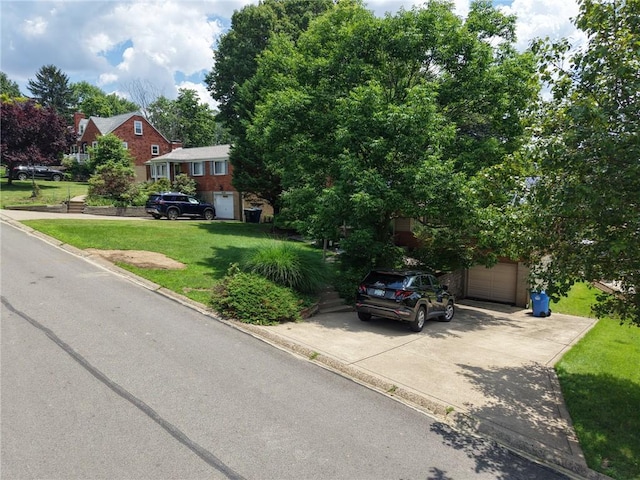 5215 Caste Dr, Whitehall, PA 15236 - view of front of property with a front lawn, driveway, and a garage