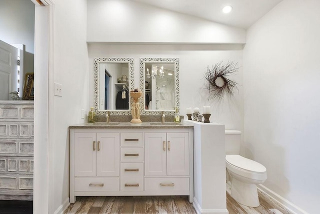 1115 Valleyview Dr, Cecil, PA 15055 - bathroom with double vanity and wood finished floors