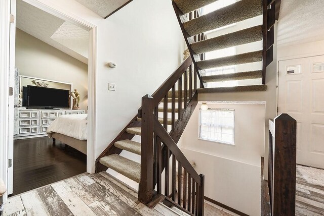 1115 Valleyview Dr, Cecil, PA 15055 - stairway with wood finished floors