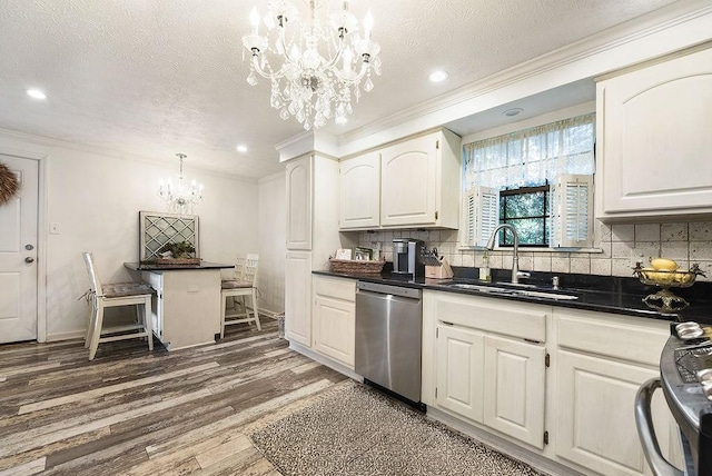 1115 Valleyview Dr, Cecil, PA 15055 - kitchen featuring dishwasher, a chandelier, crown molding, dark countertops, and decorative backsplash