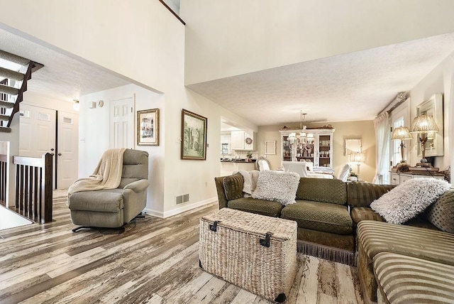 1115 Valleyview Dr, Cecil, PA 15055 - living room with wood finished floors and a textured ceiling