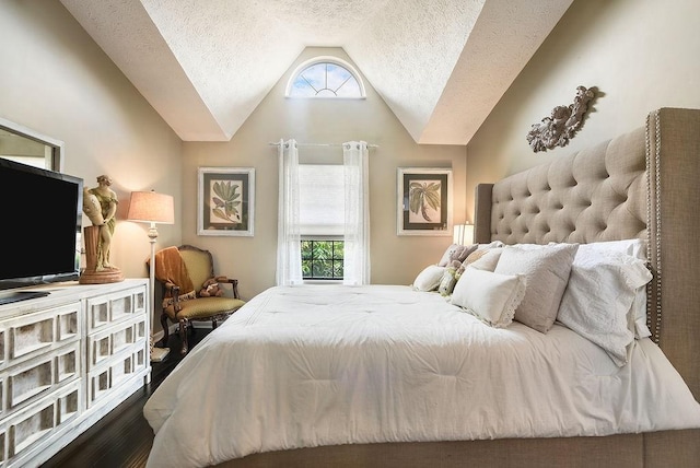 1115 Valleyview Dr, Cecil, PA 15055 - bedroom with vaulted ceiling, a textured ceiling, and wood finished floors