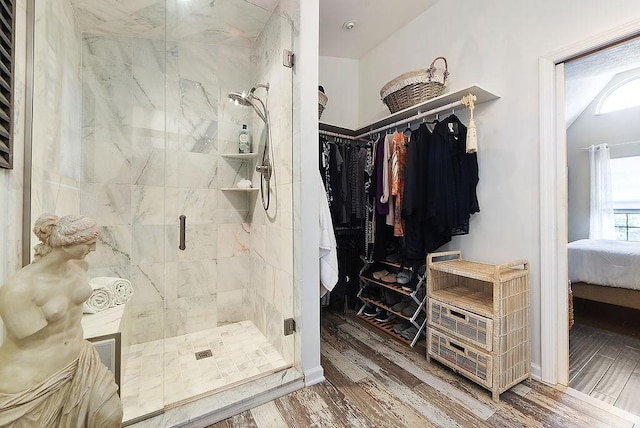1115 Valleyview Dr, Cecil, PA 15055 - ensuite bathroom featuring wood finished floors, a shower stall, and a spacious closet