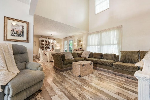 1115 Valleyview Dr, Cecil, PA 15055 - living area featuring wood finished floors and a high ceiling