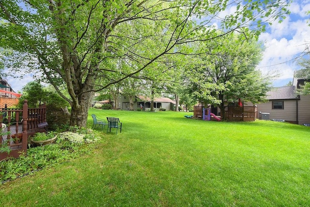 1115 Valleyview Dr, Cecil, PA 15055 - view of green lawn featuring a wooden deck
