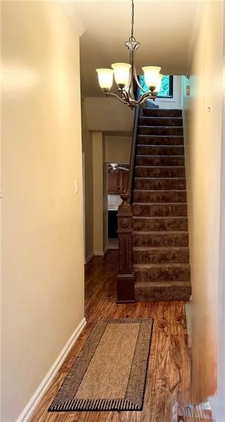 2617-2619 Spring Garden Ave, Spring Garden, PA 15212 - stairs featuring wood finished floors and a chandelier