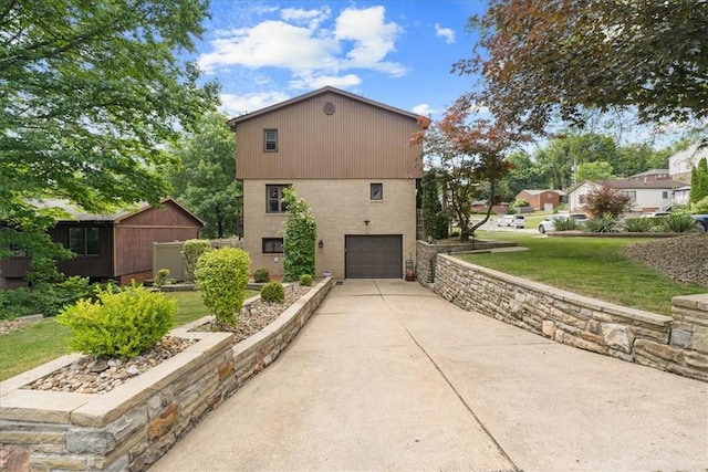 2912 Vinton, Sheraden, PA 15204 - view of property exterior with an attached garage, concrete driveway, and a yard