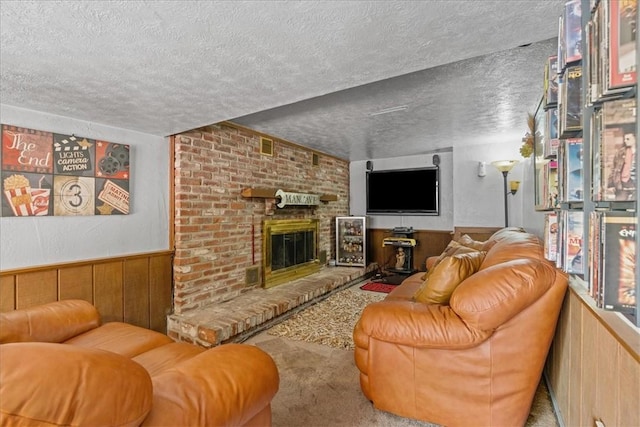 2912 Vinton, Sheraden, PA 15204 - living area with a textured ceiling, carpet flooring, a brick fireplace, a wainscoted wall, and wooden walls