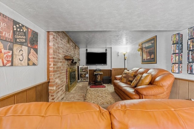 2912 Vinton, Sheraden, PA 15204 - living area featuring a wainscoted wall, wooden walls, and a fireplace