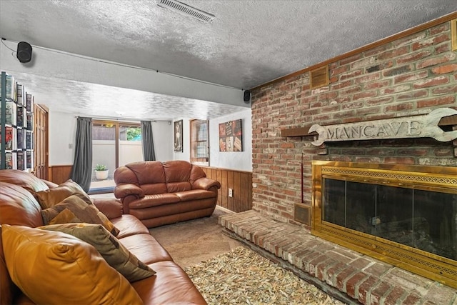 2912 Vinton, Sheraden, PA 15204 - carpeted living area with a textured ceiling, wooden walls, wainscoting, and a brick fireplace