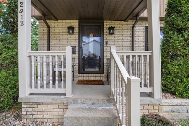 2912 Vinton, Sheraden, PA 15204 - doorway to property featuring a porch and brick siding