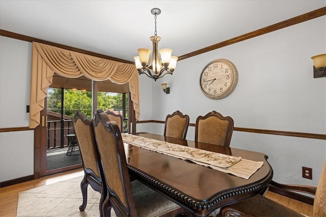 2912 Vinton, Sheraden, PA 15204 - dining room featuring a chandelier, light wood-style flooring, and crown molding