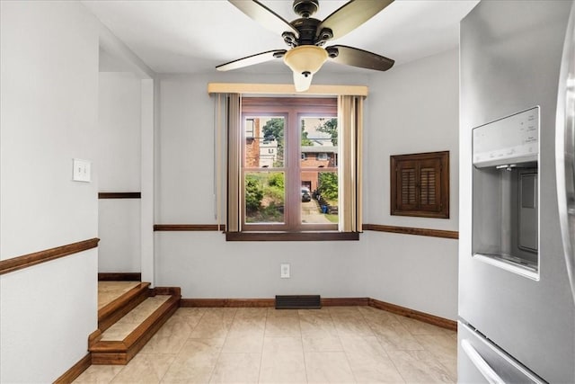 2912 Vinton, Sheraden, PA 15204 - empty room with a ceiling fan and stairway