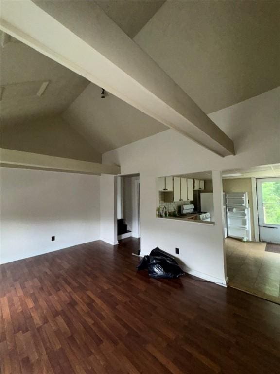5015 Walnut St, Versailles Boro, PA 15132 - living area with dark wood-style flooring and vaulted ceiling