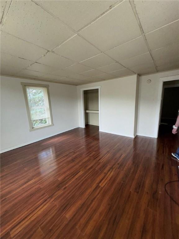 5015 Walnut St, Versailles Boro, PA 15132 - empty room featuring dark wood-style flooring and a paneled ceiling