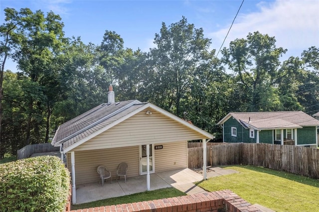 108 Republic Ave, Indiana Twp, PA 15051 - rear view of house with a patio and a fenced backyard