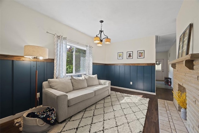 108 Republic Ave, Indiana Twp, PA 15051 - living area featuring a wainscoted wall, wood finished floors, and attic access