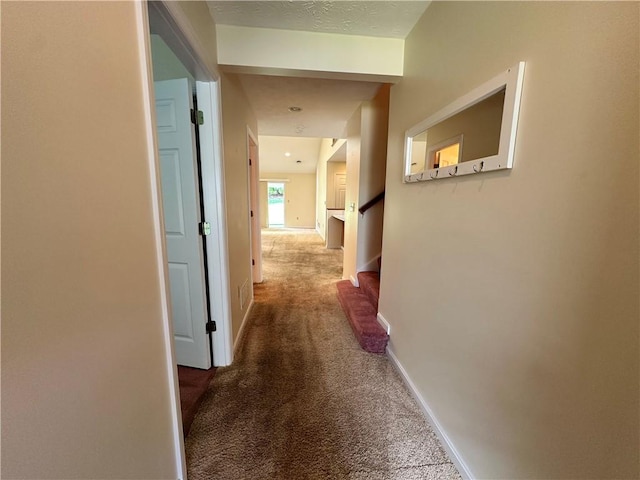 1009 Ironwood Cir, Jeannette, PA 15644 - hallway featuring carpet flooring and stairway