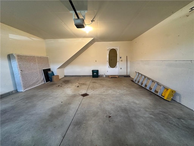 1009 Ironwood Cir, Jeannette, PA 15644 - garage featuring a garage door opener