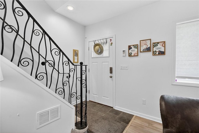 4536 Friendship Ave, Bloomfield, PA 15224 - foyer featuring stairs, recessed lighting, dark wood finished floors, and healthy amount of natural light