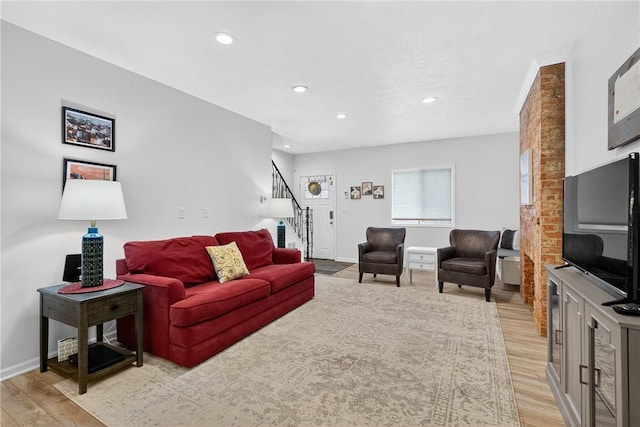 4536 Friendship Ave, Bloomfield, PA 15224 - living room with stairs, light wood-type flooring, and recessed lighting