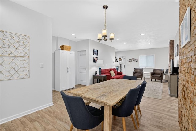 4536 Friendship Ave, Bloomfield, PA 15224 - dining room with a chandelier, light wood-style floors, and recessed lighting