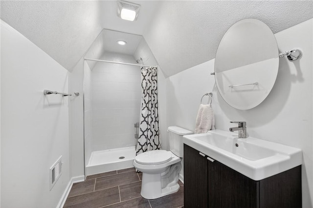 4536 Friendship Ave, Bloomfield, PA 15224 - full bathroom with vanity, a stall shower, vaulted ceiling, a textured ceiling, and recessed lighting