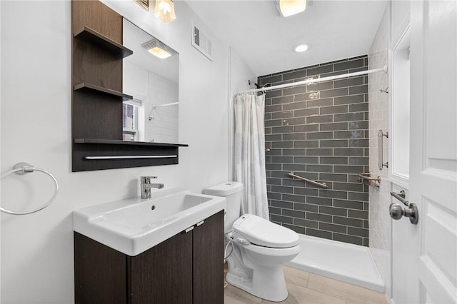 4536 Friendship Ave, Bloomfield, PA 15224 - bathroom with vanity, a tile shower, and tile patterned floors
