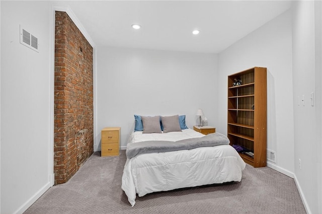 4536 Friendship Ave, Bloomfield, PA 15224 - bedroom featuring carpet, recessed lighting, and brick wall