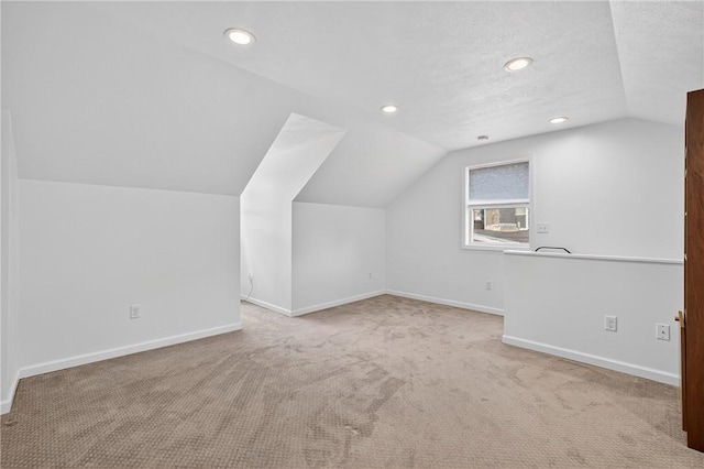 4536 Friendship Ave, Bloomfield, PA 15224 - additional living space featuring vaulted ceiling, recessed lighting, and carpet