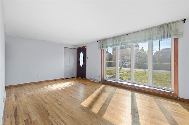242 Millport Rd, West Mifflin, PA 15122 - unfurnished room featuring wood finished floors