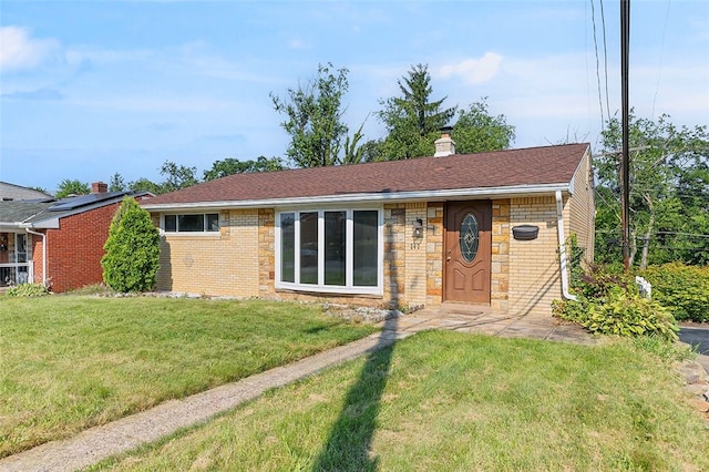 242 Millport Rd, West Mifflin, PA 15122 - single story home with brick siding, a front lawn, a chimney, and stone siding