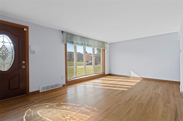 242 Millport Rd, West Mifflin, PA 15122 - entryway with wood finished floors and baseboards