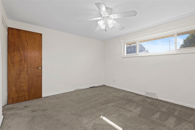 242 Millport Rd, West Mifflin, PA 15122 - carpeted empty room with baseboards and a ceiling fan