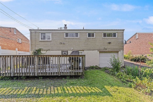 242 Millport Rd, West Mifflin, PA 15122 - rear view of property featuring a wooden deck, a yard, brick siding, and an attached garage
