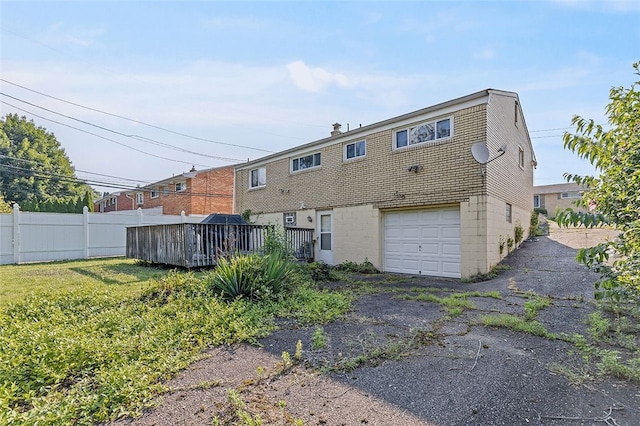 242 Millport Rd, West Mifflin, PA 15122 - back of house with an attached garage