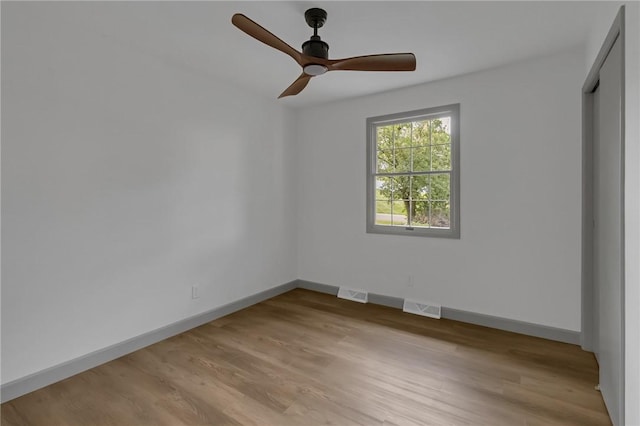 231 W Shaffer Rd, Center Twp, PA 15001 - empty room featuring light wood-style floors and a ceiling fan