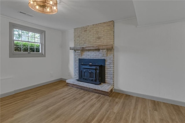 231 W Shaffer Rd, Center Twp, PA 15001 - unfurnished living room with wood finished floors and ornamental molding