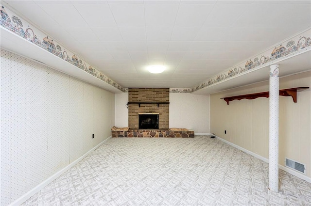 1515 George St, Unity Twp, PA 15650 - unfurnished living room with a brick fireplace and carpet