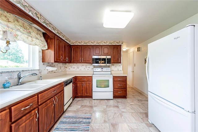 1515 George St, Unity Twp, PA 15650 - kitchen featuring white appliances, light countertops, tasteful backsplash, and brown cabinetry