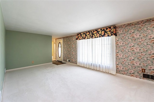 1515 George St, Unity Twp, PA 15650 - carpeted spare room featuring wallpapered walls