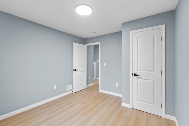 3322 Webster Ave, Schenley Heights, PA 15219 - unfurnished bedroom with light wood finished floors and baseboards