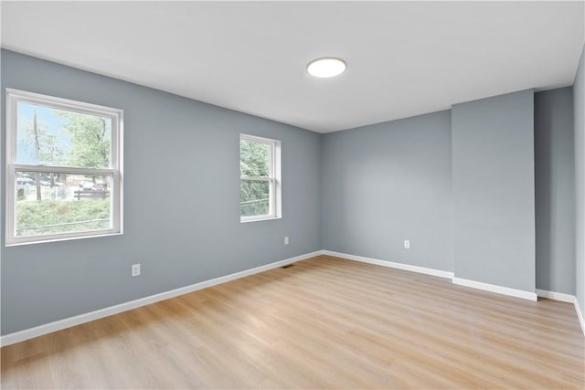 3322 Webster Ave, Schenley Heights, PA 15219 - empty room with light wood finished floors and baseboards