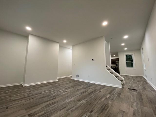 1713 Belasco Ave, Beechview, PA 15216 - unfurnished living room featuring dark wood-style flooring, recessed lighting, and stairs
