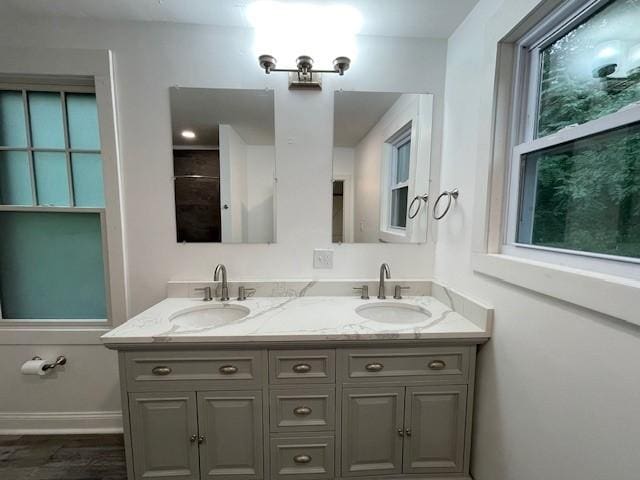1713 Belasco Ave, Beechview, PA 15216 - bathroom with double vanity and wood finished floors