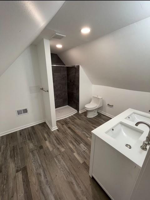 1713 Belasco Ave, Beechview, PA 15216 - full bathroom featuring lofted ceiling, tiled shower, wood finished floors, and double vanity