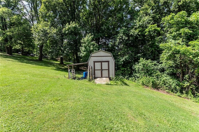 132 Spaugy Hollow Rd, Bullskin Twp, PA 15425 - view of green lawn with a storage shed