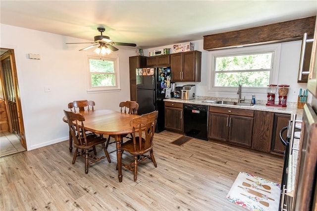 132 Spaugy Hollow Rd, Bullskin Twp, PA 15425 - kitchen featuring black appliances, light wood-type flooring, light countertops, and ceiling fan