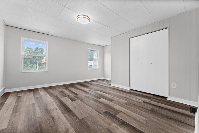 613-615 W Main St, Carnegie, PA 15106 - unfurnished bedroom with wood finished floors, a drop ceiling, and a closet